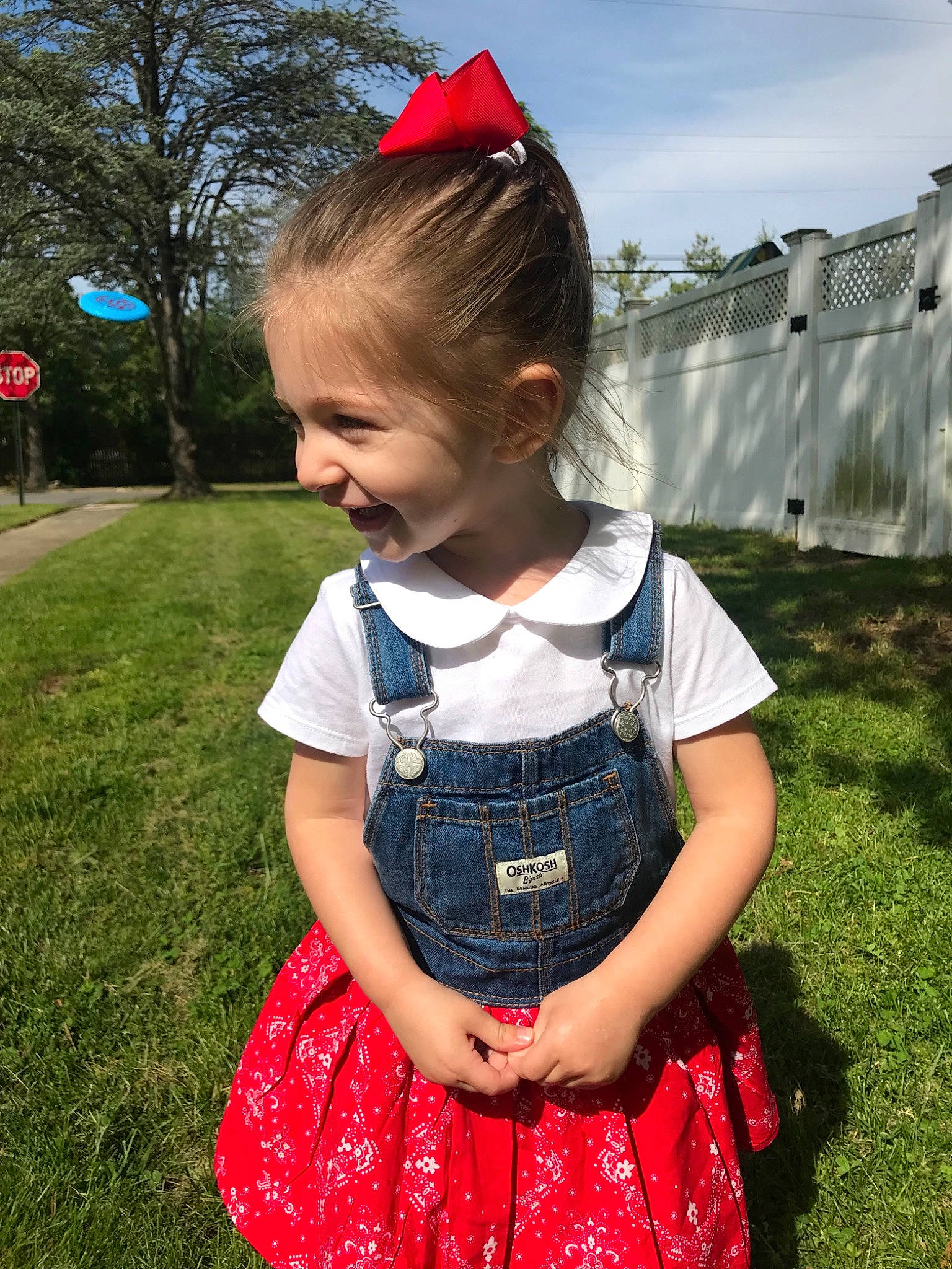 Noel joined the competition — help win amazing prizes! baby_products, child, clothing, costume, design, dress, grass, hair_accessory, headband, headgear, pattern, person, pink, plaid, product, red, summer, t_shirt, textile, toddler