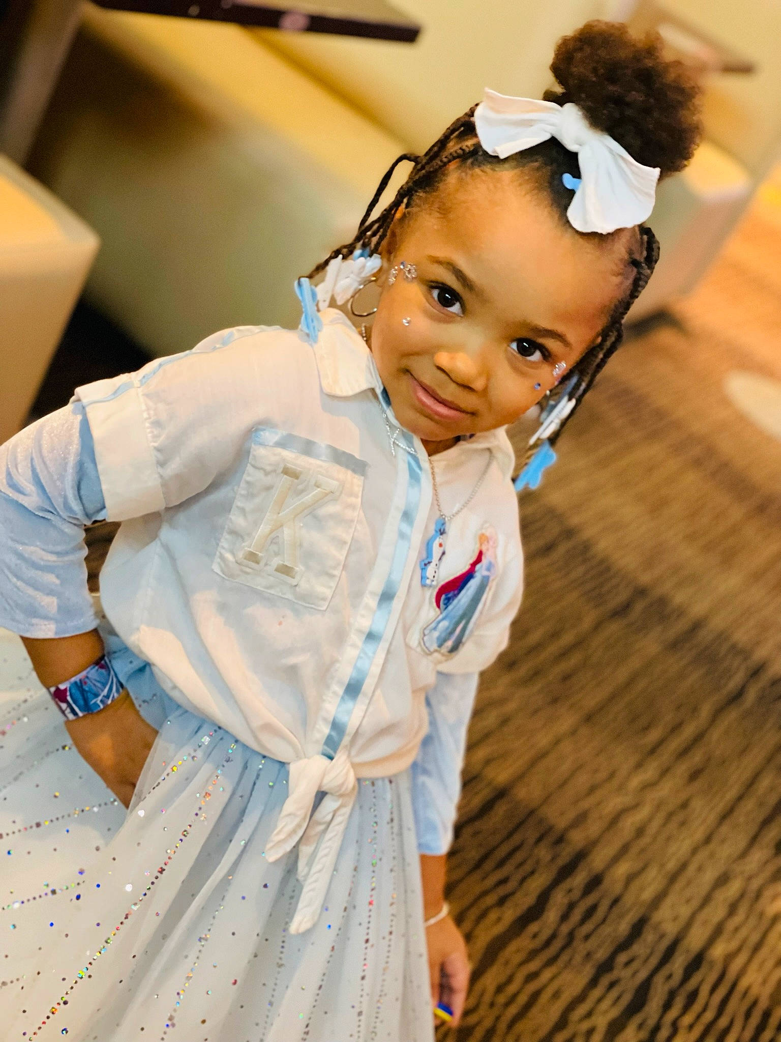 Kamora is registered to the contest to win money with this photo: baby_toddler_clothing, child, costume, dress, electric_blue, event, face, fashion_accessory, fashion_design, fun, gesture, happy, jewellery, necklace, outerwear, person, skin, sleeve, smile, toddler