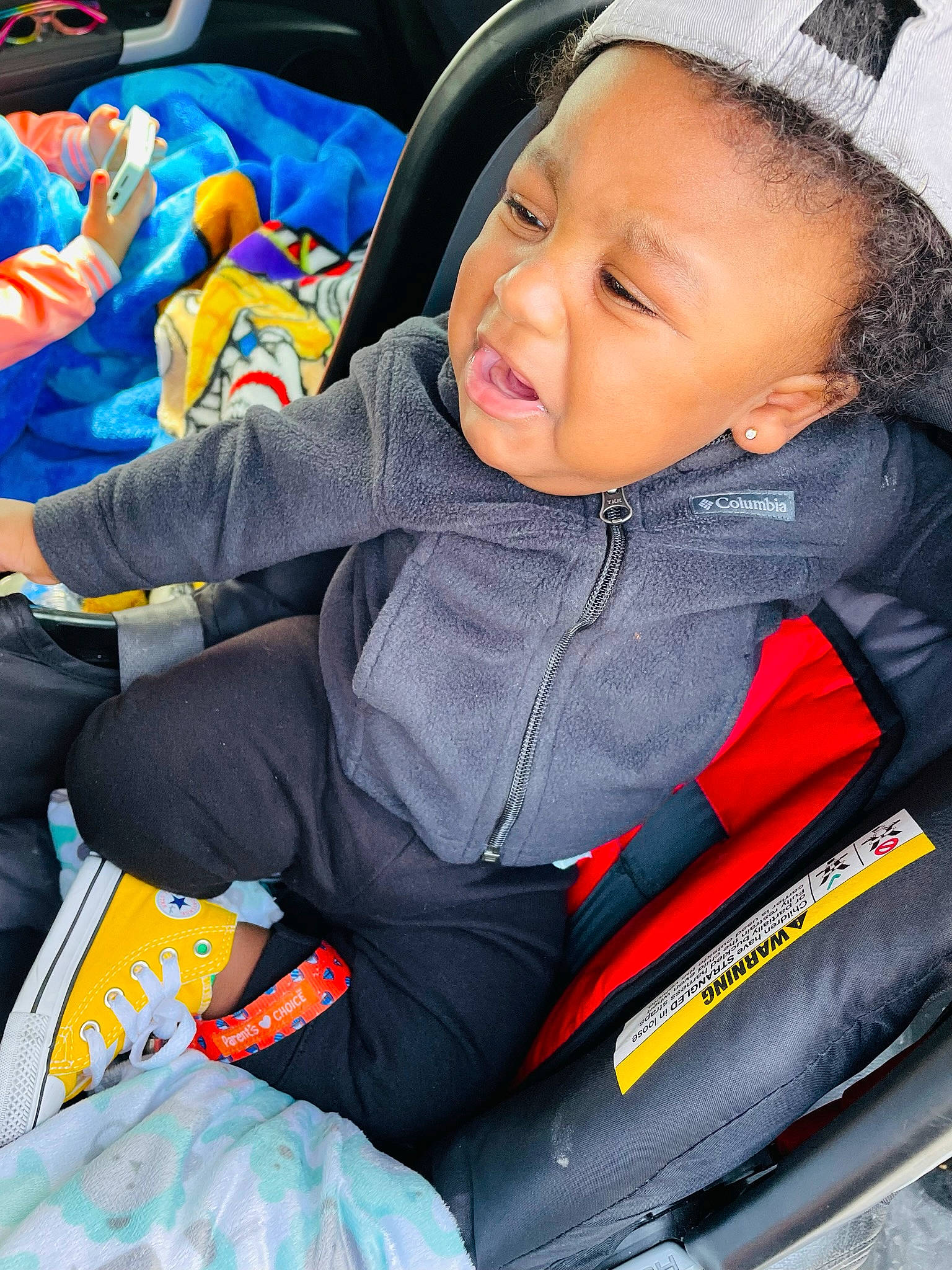 Kaidyn Blackburn is registered to the contest to win money with this photo: baby, baby_carriage, baby_products, baby_toddler_clothing, blue, car_seat, child, comfort, electric_blue, fun, happy, leisure, person, photograph, product, sitting, smile, snapshot, toddler, toy