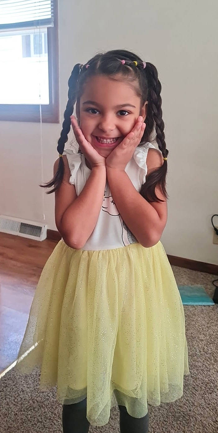 Laura Sophia is registered to the contest to win money with this photo: beauty, day_dress, dress, face, formal_wear, fun, gesture, hair, happy, human_body, joy, long_hair, neck, one_piece_garment, person, shoulder, skin, sleeve, smile, toddler