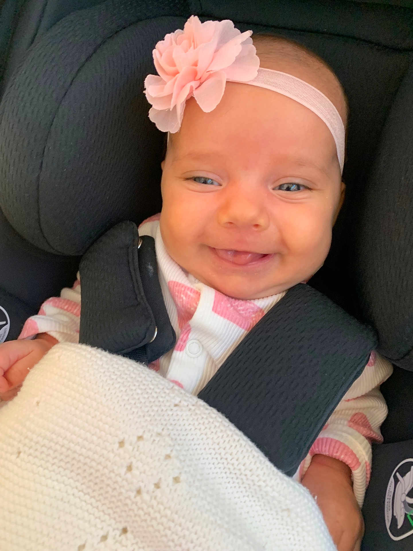 Suzanna is registered to the contest to win money with this photo: accessories, baby, belt, clothing, coat, cushion, dress, face, flower, happy, head, homedecor, jacket, newborn, person, petal, photography, plant, portrait, smile