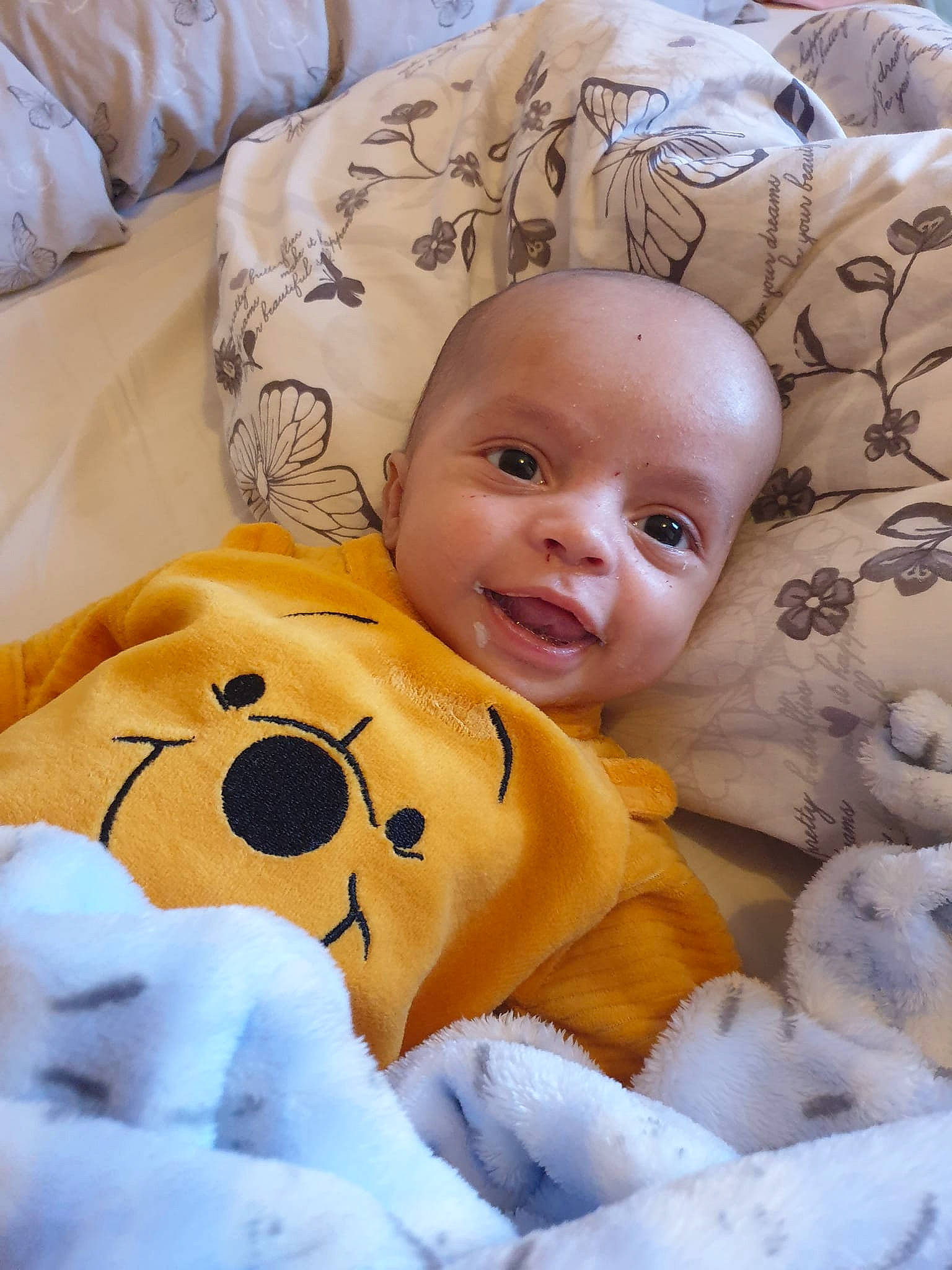 Ashton-lee is registered to the contest to win money with this photo: baby, baby_sleeping, baby_toddler_clothing, bed, bedding, cheek, child, comfort, facial_expression, fun, happy, linens, nose, person, product, skin, smile, textile, toddler, white