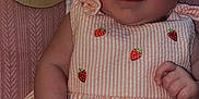 Willow joined the competition — help win amazing prizes! baby, background, child, clothing, cute, dress, eyes, face, hand, infant, milestone, person, pink, portrait, sitting, strawberry_pattern, text, texture, two_months, wooden_sign