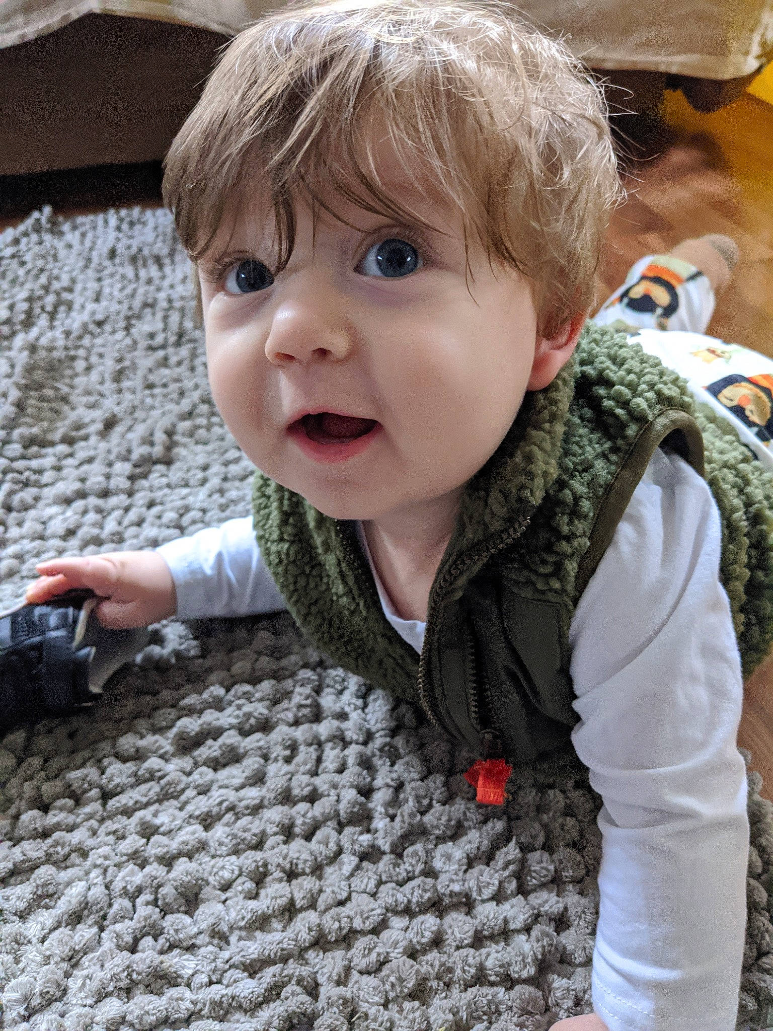 Samuel is registered to the contest to win money with this photo: baby, cheek, child, chin, eye, face, facial_expression, fun, head, nose, outerwear, person, play, skin, smile, toddler, vacation