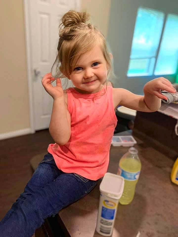 Emmy is registered to the contest to win money with this photo: child, joy, person, play, shoulder, standing, toddler, water, water_bottle