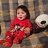 Steven joined the competition — help win amazing prizes! child, comfortable, couch, cozy, cute, face, happy, indoor, mickey_mouse, minnie_mouse, patterned_fabric, person, plush_toy, red_pajamas, seated, skeleton_plush, smiling, toddler, toy, young_child