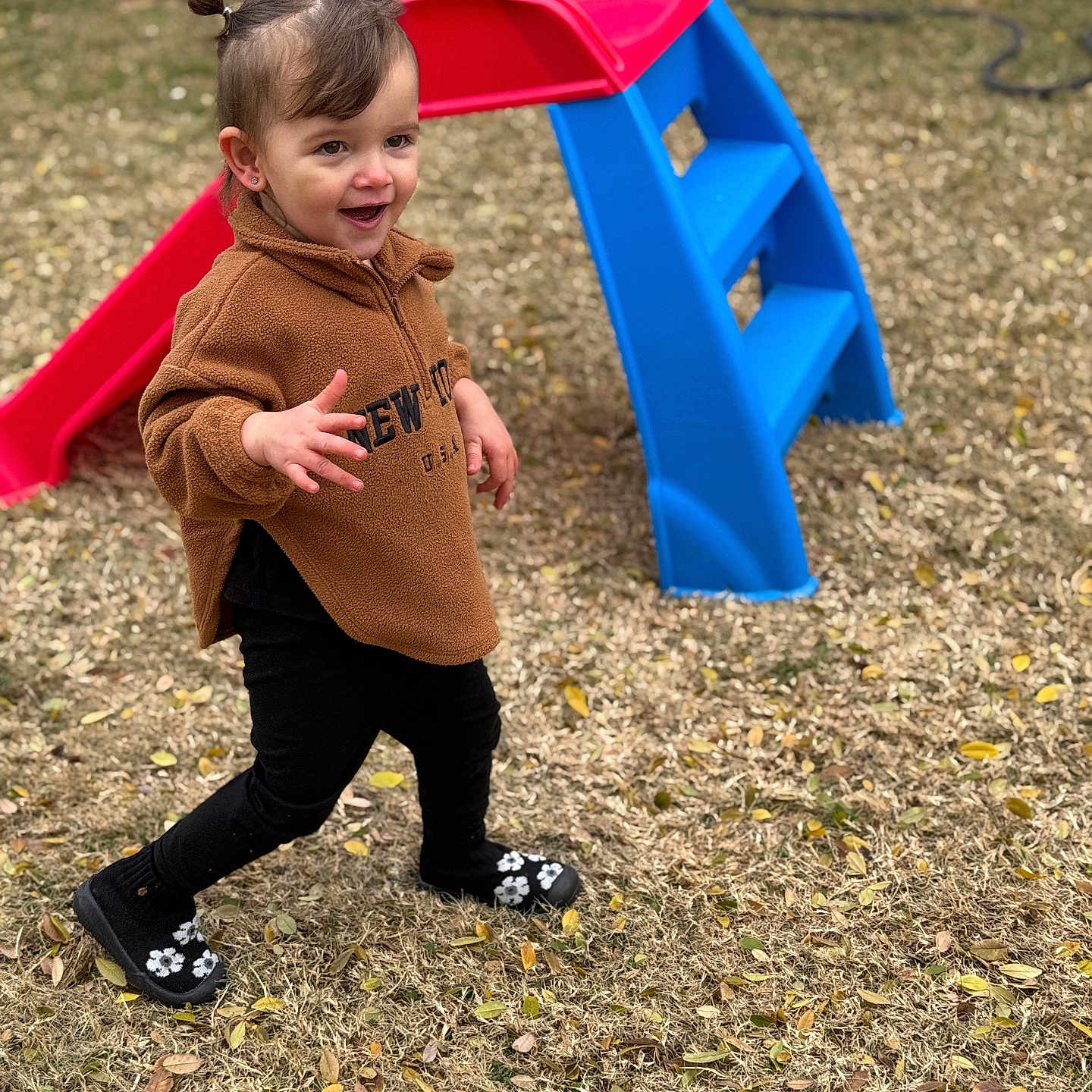 Delilah is registered to the contest to win money with this photo: bodypart, boy, child, clothing, face, finger, footwear, grass, hand, head, male, outdoorplayarea, outdoors, pants, person, photography, plant, playarea, portrait, shoe