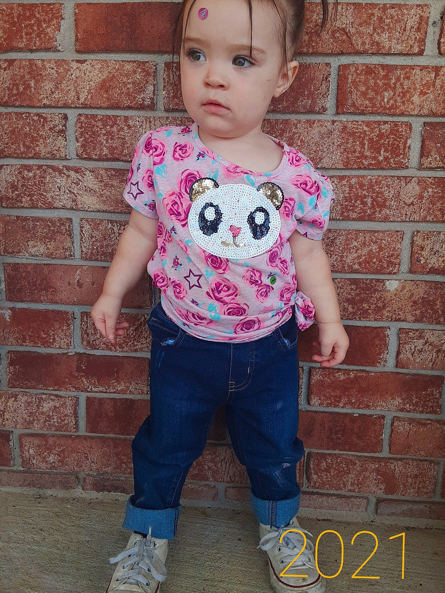 Katalina joined the competition — help win amazing prizes! arm, baby_toddler_clothing, cheek, chin, eye, face, facial_expression, hair, hairstyle, head, human_body, jeans, lip, neck, person, photograph, pink, skin, sleeve, standing