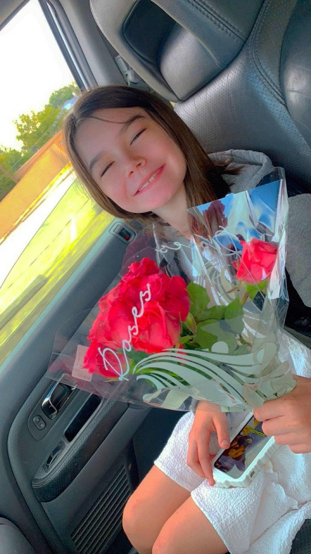 Taylyn joined the competition — help win amazing prizes! auto_part, automotive_design, automotive_exterior, automotive_lighting, car, car_seat, finger, flower, hand, happy, hood, joy, motor_vehicle, person, personal_luxury_car, petal, plant, rose, smile, textile