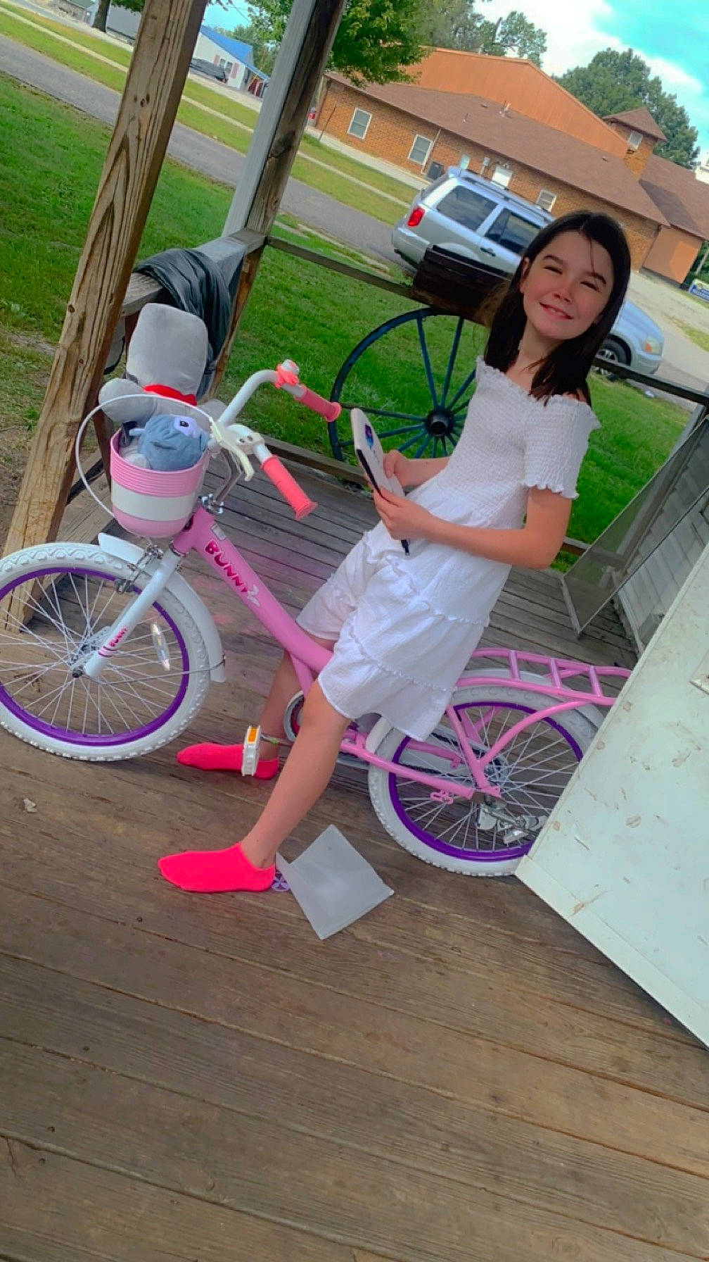 Taylyn is registered to the contest to win money with this photo: bicycle, bicycle_accessory, bicycle_fork, bicycle_frame, bicycle_handlebar, bicycle_part, bicycle_saddle, bicycle_tire, bicycle_wheel, bicycle_wheel_rim, bicycles_equipment_and_supplies, crankset, joy, leisure, mode_of_transport, person, pink, rim, spoke, tire