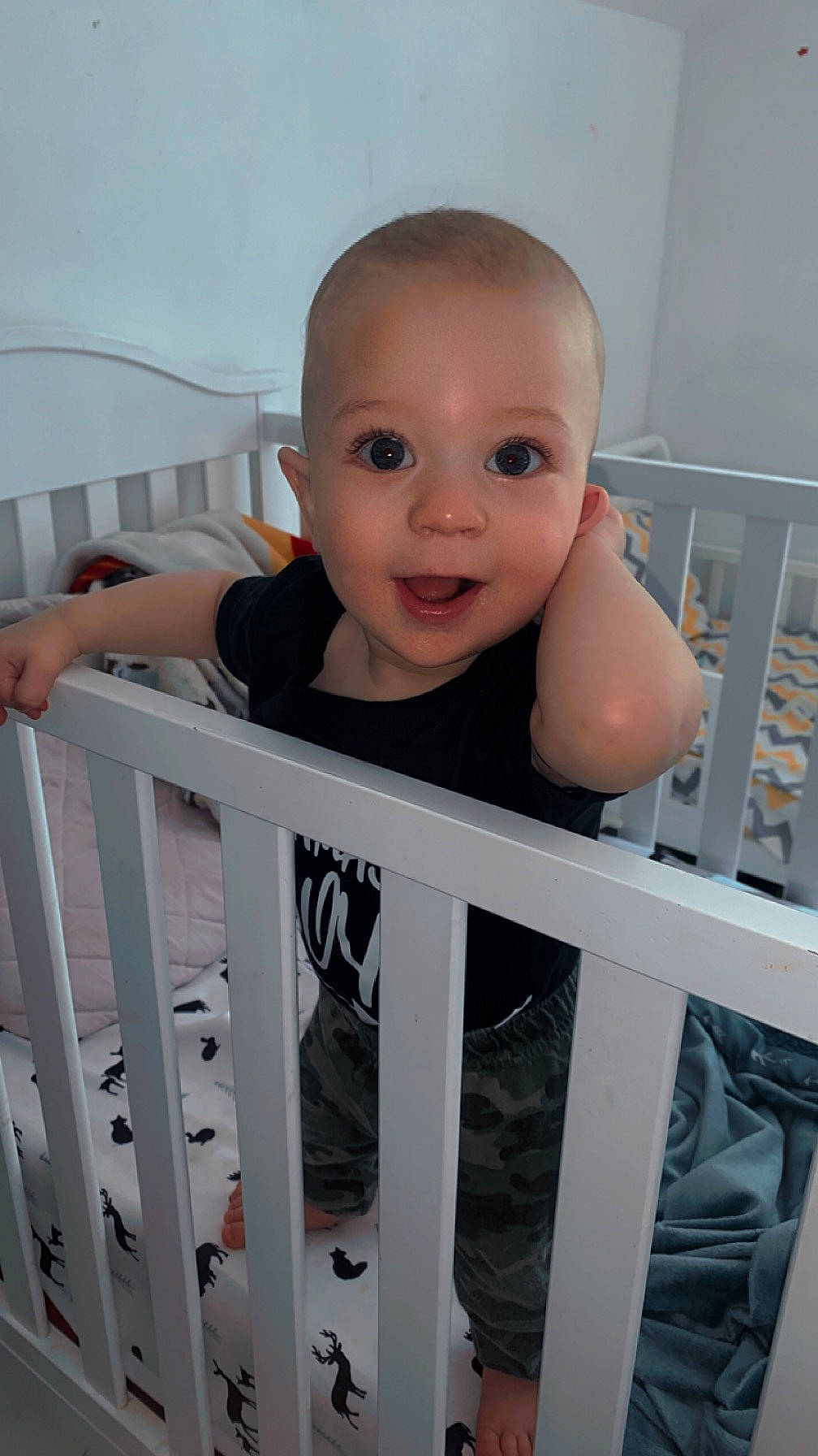 Treyson joined the competition — help win amazing prizes! baby, baby_safety, baby_toddler_clothing, cheek, child, cradle, eye, facial_expression, fence, happy, infant_bed, iris, organ, person, product, skin, sleeve, smile, standing, surprise