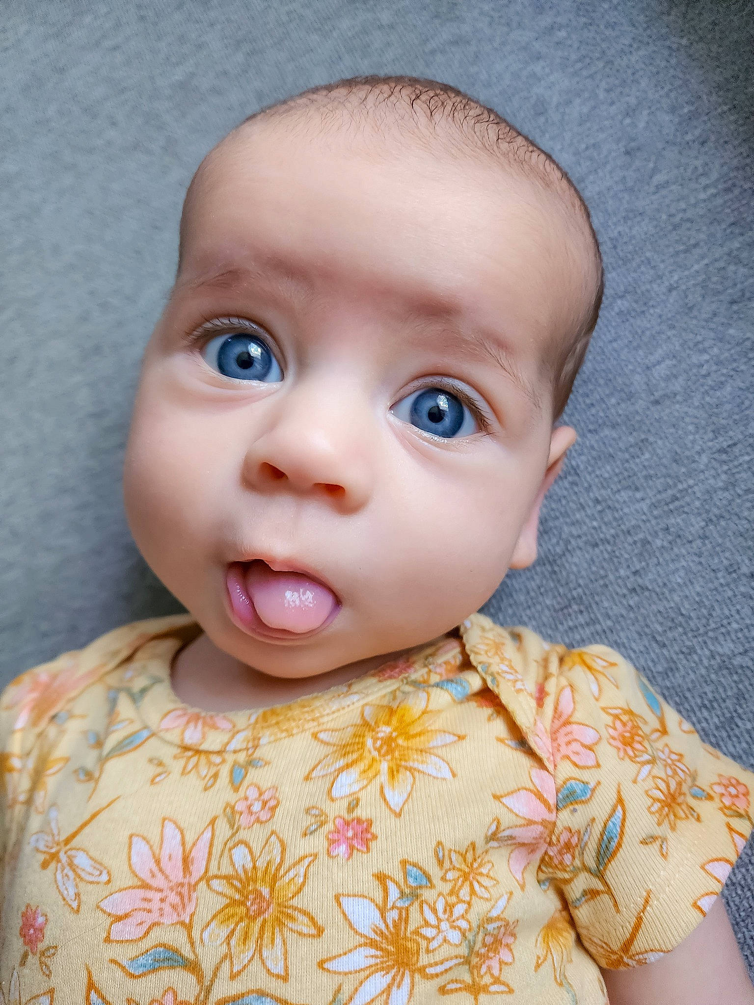 Emilia joined the competition — help win amazing prizes! baby, baby_toddler_clothing, cheek, child, doll, dress, eyebrow, eyelash, iris, lip, magenta, neck, nose, pattern, peach, person, pink, skin, sleeve, toddler