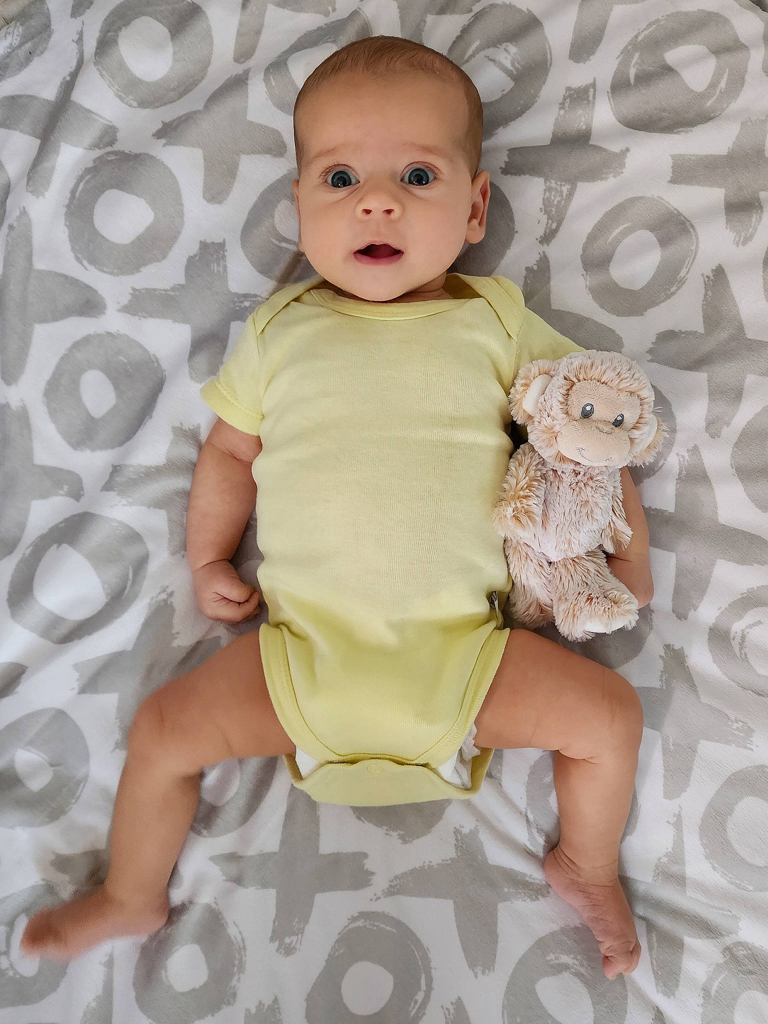 Emilia joined the competition — help win amazing prizes! baby, baby_toddler_clothing, cheek, child, comfort, eye, face, happy, human_leg, linens, pattern, person, pink, sitting, skin, sleeve, stomach, textile, thigh, thumb