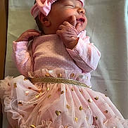 Aubrie is registered to the contest to win money with this photo: child, girl, infant, petal, pink, product, textile