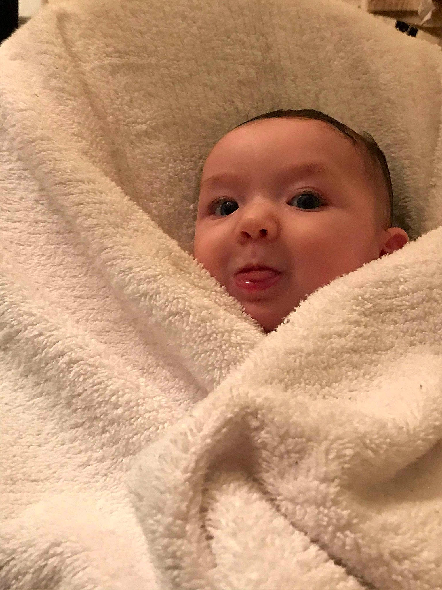 Lauralie a rejoint le concours — aidez-le/la à gagner de superbes lots ! baby, cheek, child, chin, comfort, eyebrow, face, facial_expression, fur, happy, headgear, headwear, linens, person, skin, sleeve, toddler, towel