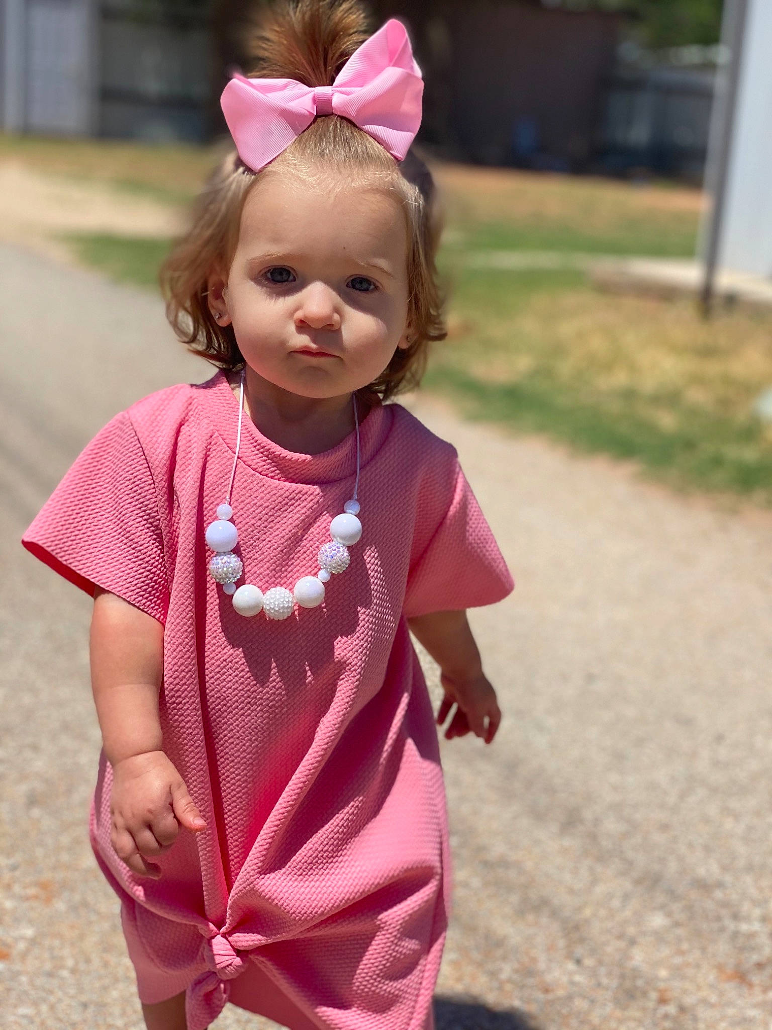 Kynleigh joined the competition — help win amazing prizes! baby, child, dress, ear, face, fun, hair_accessory, head, headband, pattern, person, pink, plant, play, skin, sleeve, smile, toddler, walking