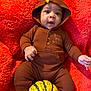 baby, infant, onesie, hood, turkey_costume, pumpkin, orange_blanket, cute, child, portrait, cozy, fall, autumn, holiday, thanksgiving, smiling, lying_down, hand, face, expression
