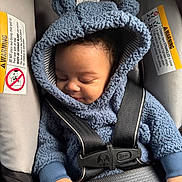 Karter is registered to the contest to win money with this photo: baby, blue_hoodie, car_seat, child, cozy, cute, fuzzy_clothing, hands, headwear, indoors, infant, peaceful, portrait, resting, safety, seatbelt, sleeping, straps, toddler, warm_clothing
