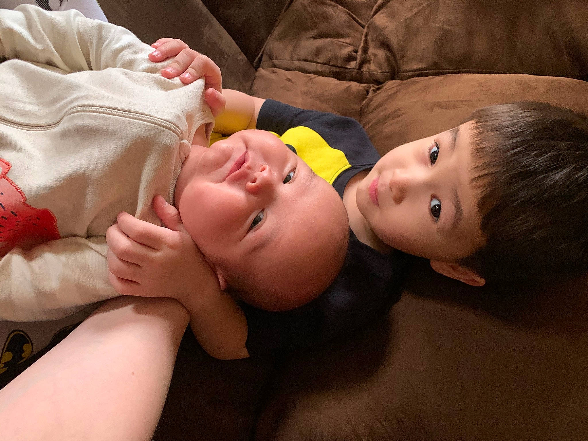 Hunter is registered to the contest to win money with this photo: baby, cheek, comfort, eye, eyebrow, eyelash, flash_photography, flooring, fun, gesture, happy, head, human_body, iris, lip, mouth, nose, person, skin, toddler