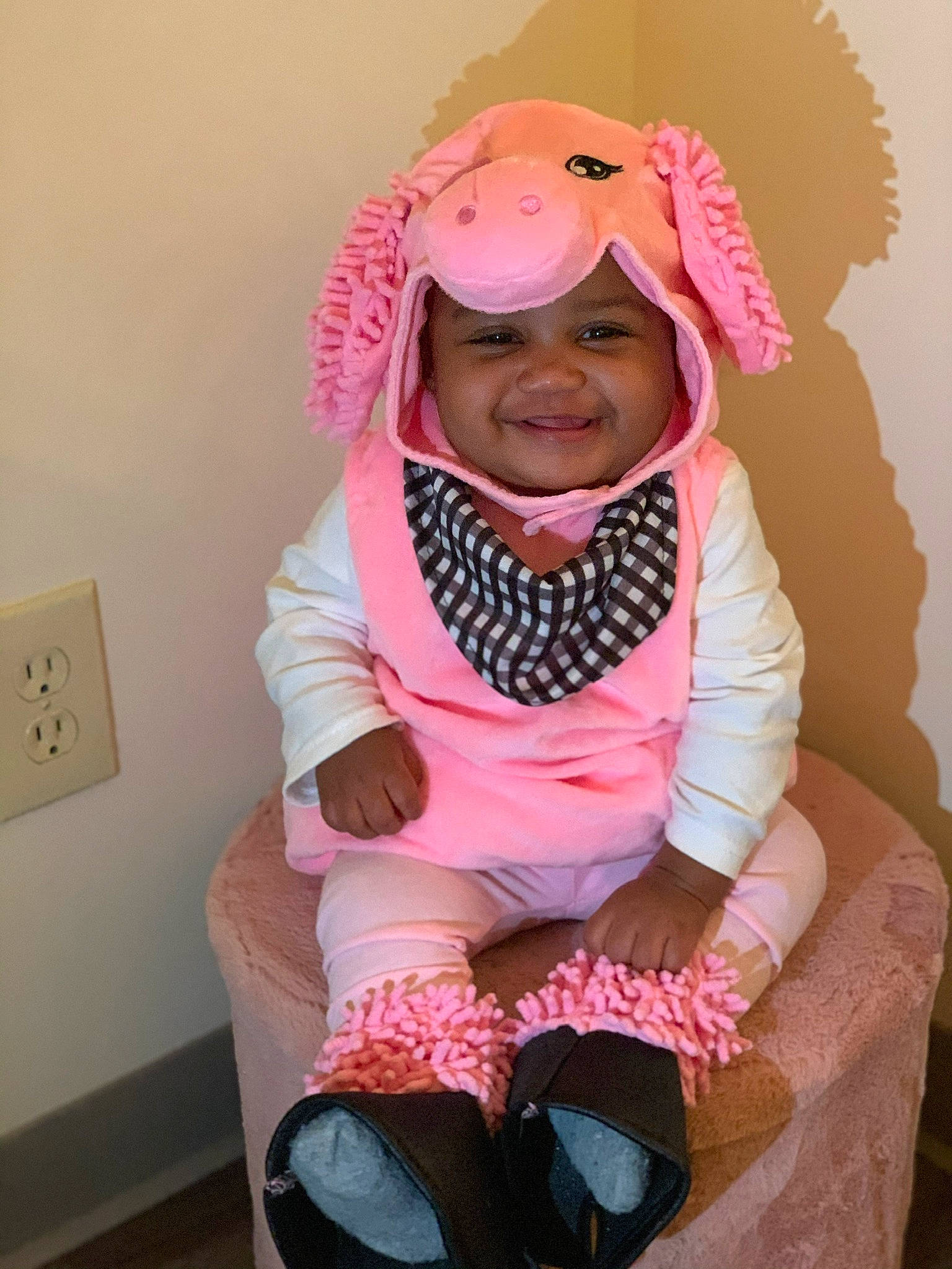 Jay'Ana is registered to the contest to win money with this photo: baby, baby_toddler_clothing, boot, cheek, child_model, comfort, headwear, hood, human_body, joy, lap, mouth, nose, peach, person, pink, power_plugs_and_sockets, shoe, skin, sock