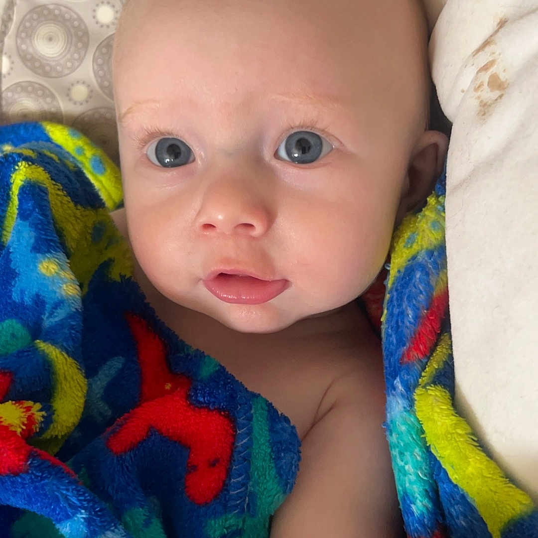 Xavier joined the competition — help win amazing prizes! accessories, baby, bed, bedroom, blanket, bodypart, cradle, crib, cushion, earring, face, finger, furniture, hand, happy, head, homedecor, indoors, infantbed, jewelry