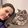 Guarana participe au concours pour gagner de l'argent avec cette photo : animal, casual, cat, closeup, companion, cozy, domestic, face, feline, friendship, gray_cat, human, indoor, leather_couch, pet, portrait, relaxed, resting, smile, woman