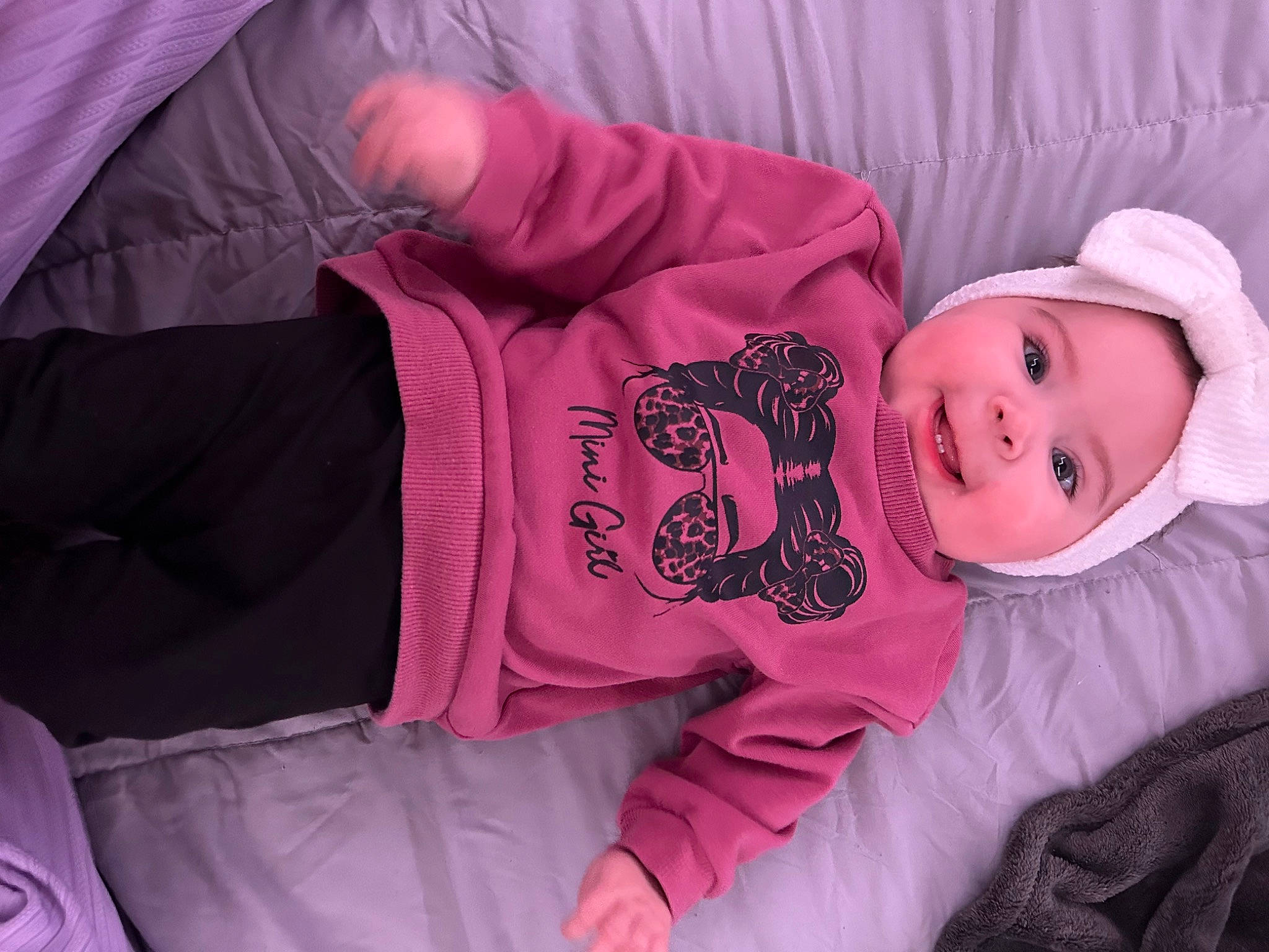 Summer joined the competition — help win amazing prizes! baby, baby_products, baby_sleeping, baby_toddler_clothing, cheek, child, comfort, happy, hat, headwear, human, magenta, outerwear, person, pink, purple, skin, sleeve, smile, textile