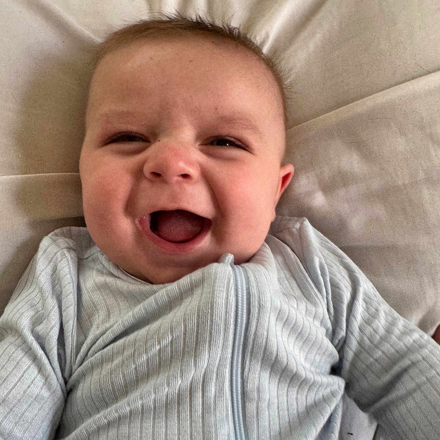 Noah is registered to the contest to win money with this photo: baby, babylaughing, face, happy, head, laughing, newborn, person, photography, portrait, smile