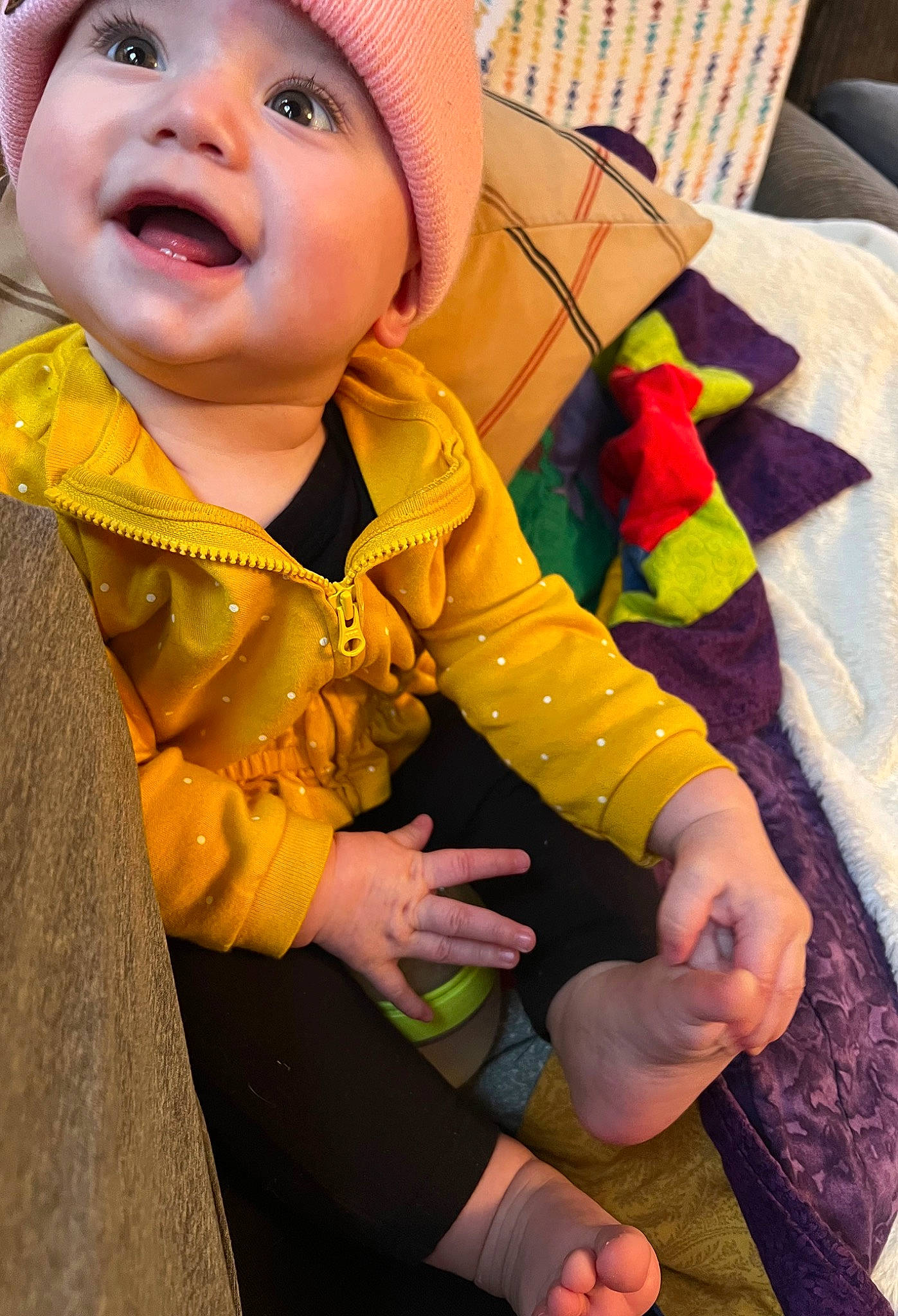 Rozalyn is registered to the contest to win money with this photo: baby, baby_laughing, baby_toddler_clothing, cap, child, comfort, eye, fashion_accessory, fun, happy, hat, head, headwear, human_body, human_leg, person, skin, smile, textile, thigh