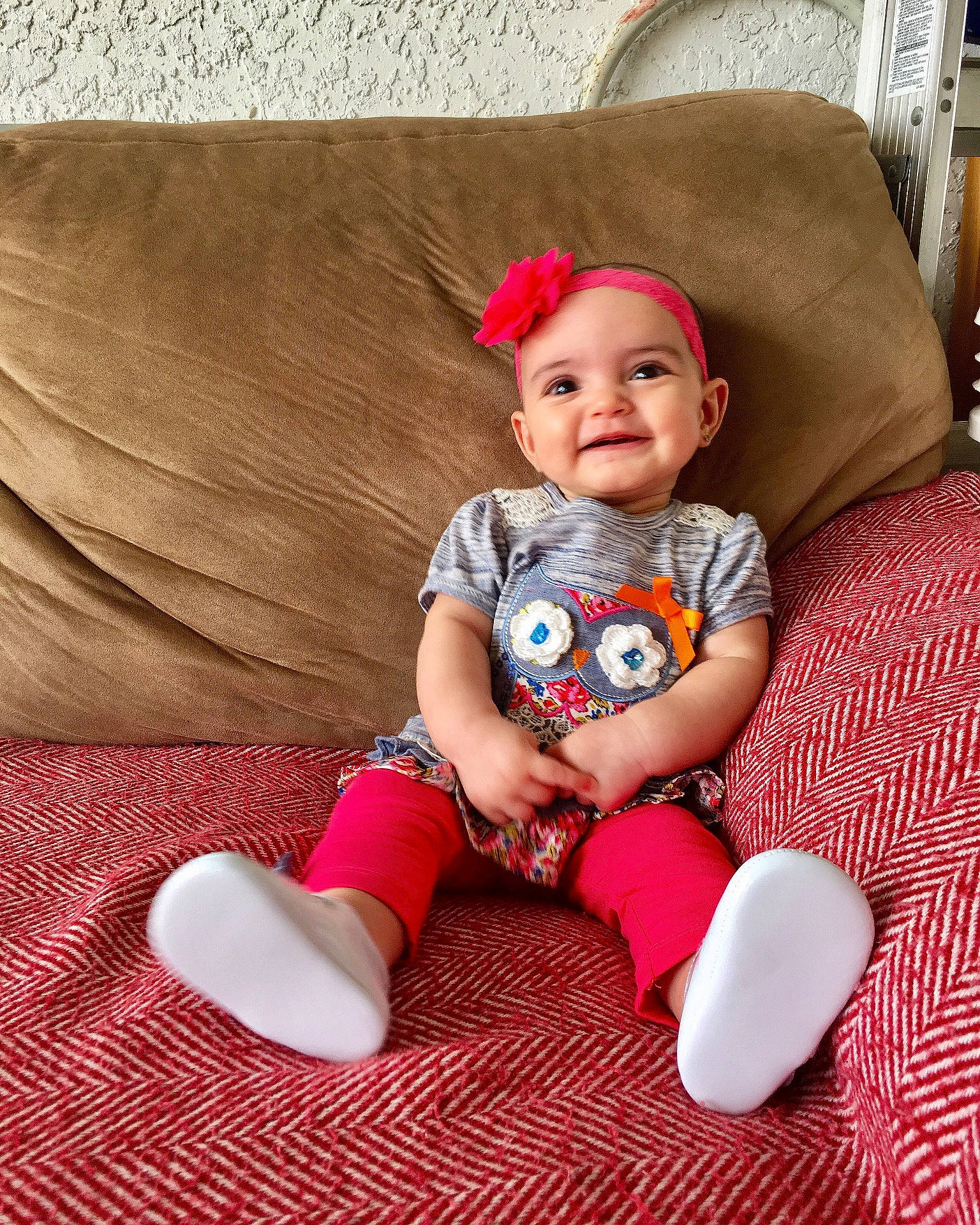 Coraline joined the competition — help win amazing prizes! baby_products, child, fun, girl, infant, person, pink, product, red, sitting, skin, smile, textile, toddler