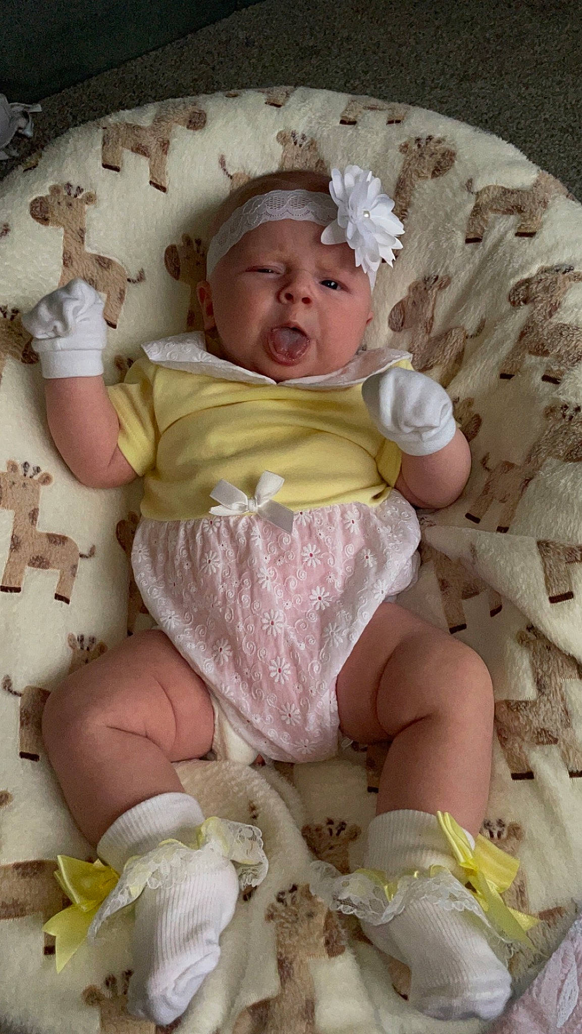 Darcie joined the competition — help win amazing prizes! baby, baby_products, baby_sleeping, baby_toddler_clothing, cheek, child, comfort, face, foot, headwear, human_body, linens, pattern, person, pink, sitting, skin, sleeve, sock, thigh