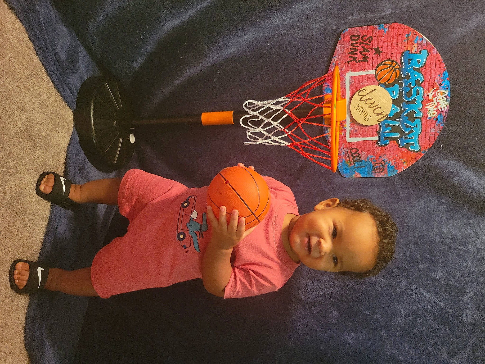 Esteban joined the competition — help win amazing prizes! baby, baby_products, baby_toddler_clothing, child, drum, hat, logo, musical_instrument, orange, person, sleeve, t_shirt, toddler