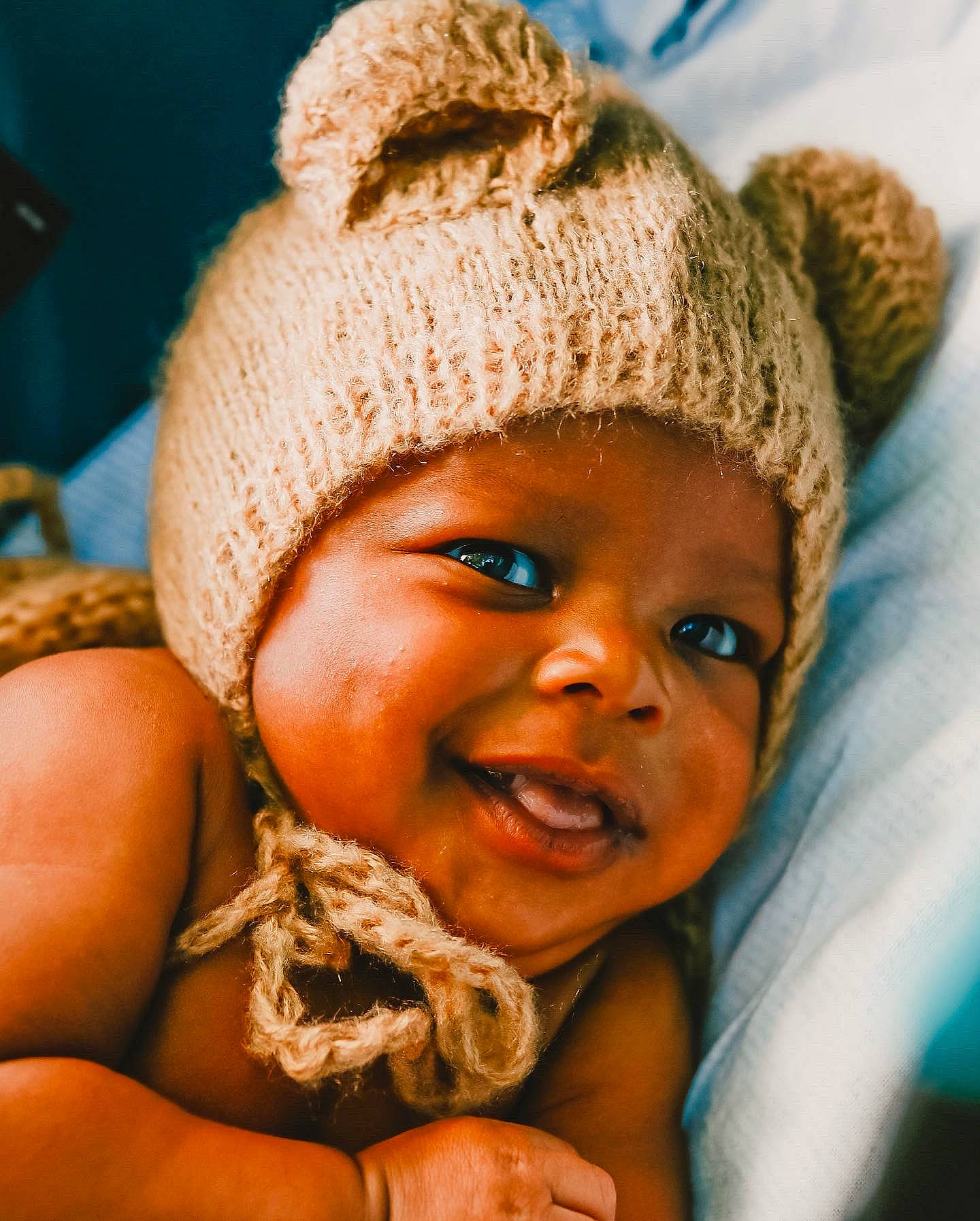 Zhakhari joined the competition — help win amazing prizes! baby, cap, cheek, child, close_up, eye, facial_expression, finger, fun, gesture, happy, headwear, iris, knit_cap, lip, mouth, nose, person, skin, smile