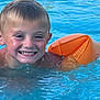 child, boy, swimming, pool, water, floaties, orange, smiling, happy, wet, summer, outdoor, fun, play, portrait, face, head, skin, young, recreation
