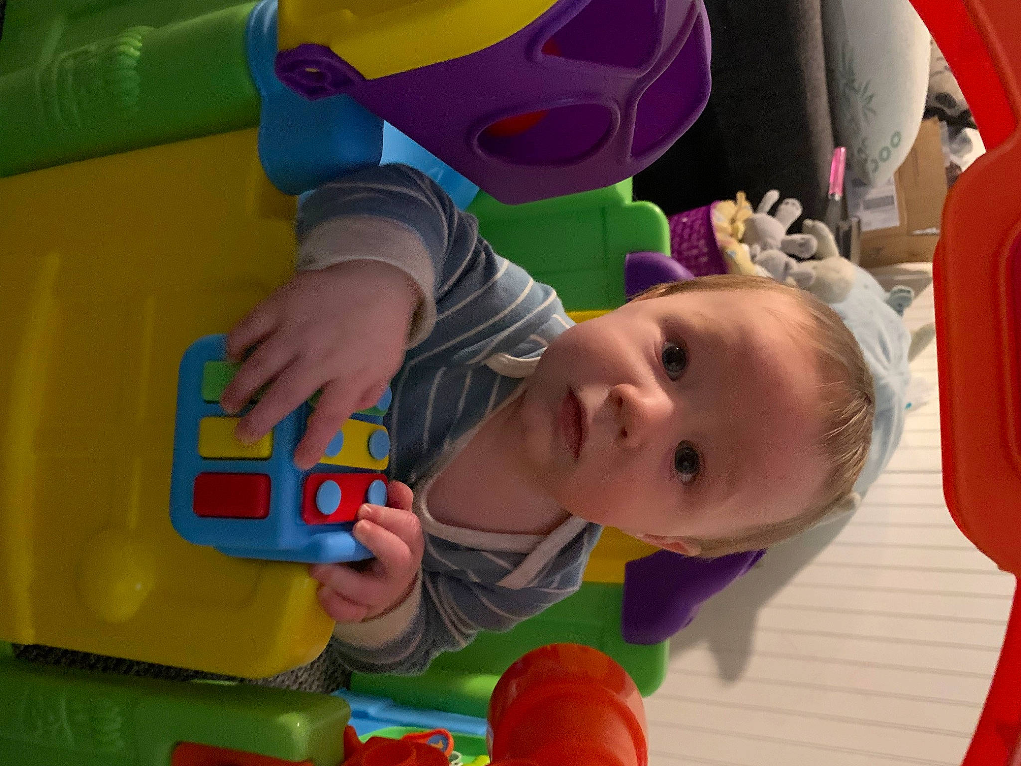 Grant is registered to the contest to win money with this photo: baby, baby_playing_with_toys, baby_products, cheek, child, face, fun, happy, head, leisure, nose, organ, person, play, product, recreation, room, snapshot, toddler, toy