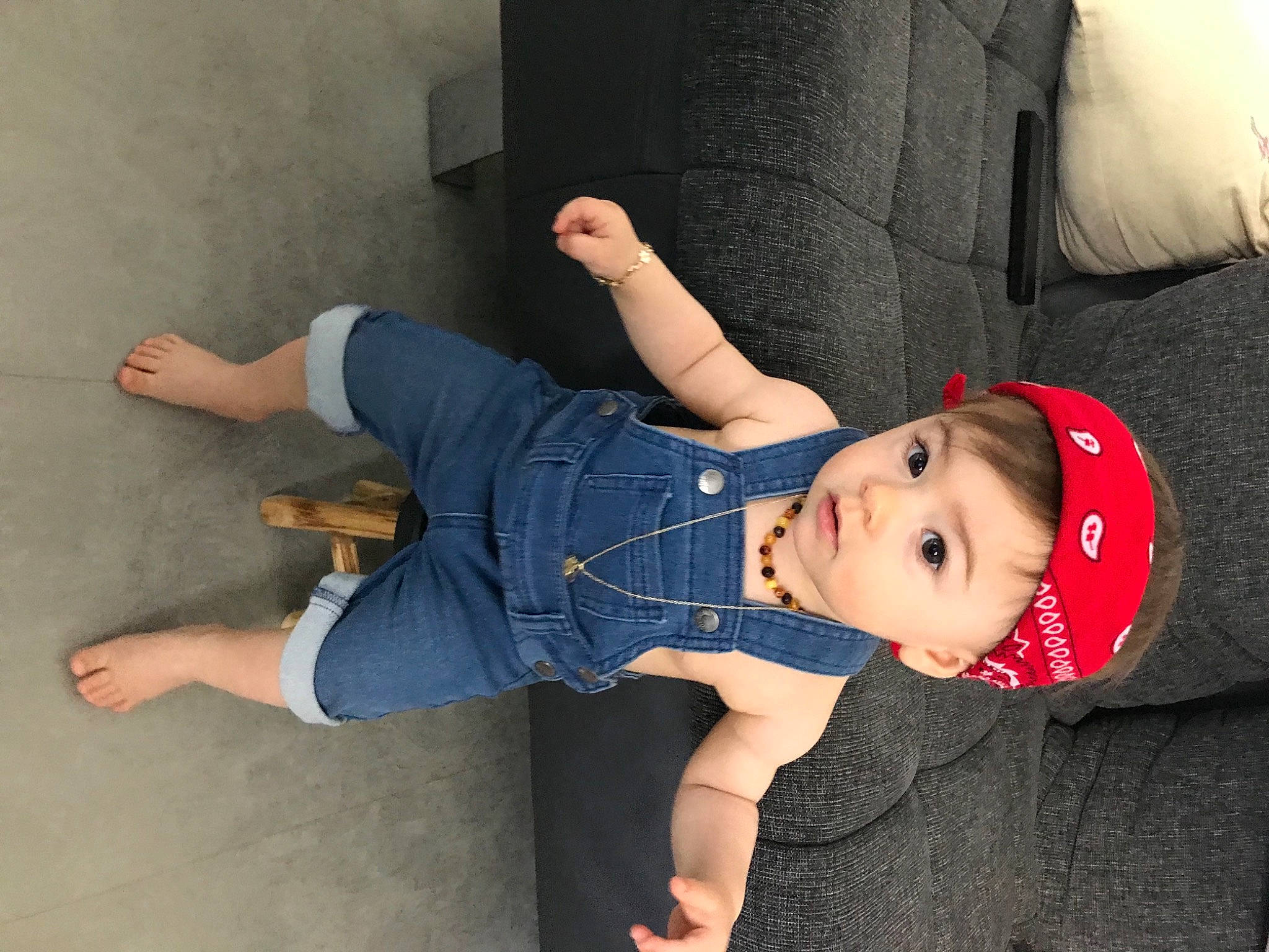 Ecrin-nisa participe au concours pour gagner de l'argent avec cette photo : arm, baby, baby_toddler_clothing, comfort, cool, denim, elbow, eye, finger, flash_photography, joint, knee, lap, leg, person, sleeve, smile, sock, textile, thigh