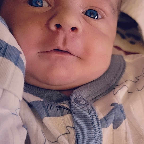 Jonah is registered to the contest to win money with this photo: baby, baby_toddler_clothing, cheek, chin, collar, dress_shirt, eyebrow, facial_expression, finger, forehead, happy, iris, jacket, lip, mouth, nose, skin, sleeve, textile, toddler