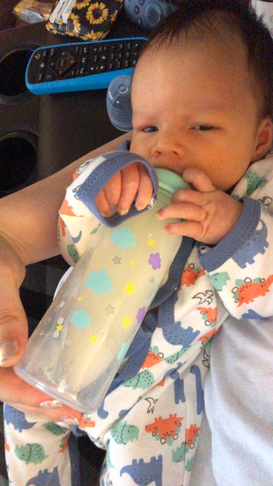 Lucca is registered to the contest to win money with this photo: baby, baby_toddler_clothing, cheek, child, ear, eyelash, face, finger, gesture, hand, head, iris, lip, mouth, nail, nose, person, skin, sleeve, thumb