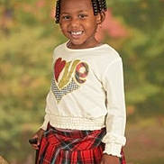 Tyjhanae joined the competition — help win amazing prizes! baby, babylaughing, blackhair, child, clothing, face, female, girl, hair, happy, head, kilt, person, photography, portrait, sitting, skirt, sleeve, smile, tartan