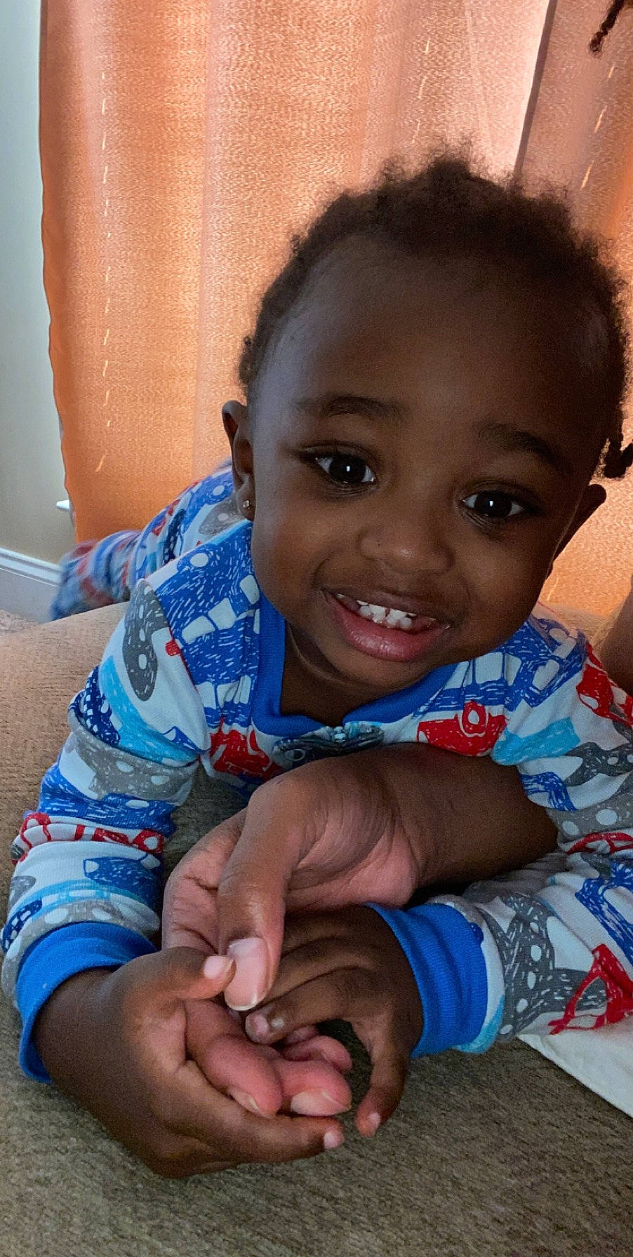 Kiyan is registered to the contest to win money with this photo: adaptation, arm, baby, cheek, child, eye, face, facial_expression, finger, hand, happy, head, joy, lip, mouth, nose, person, sitting, skin, smile