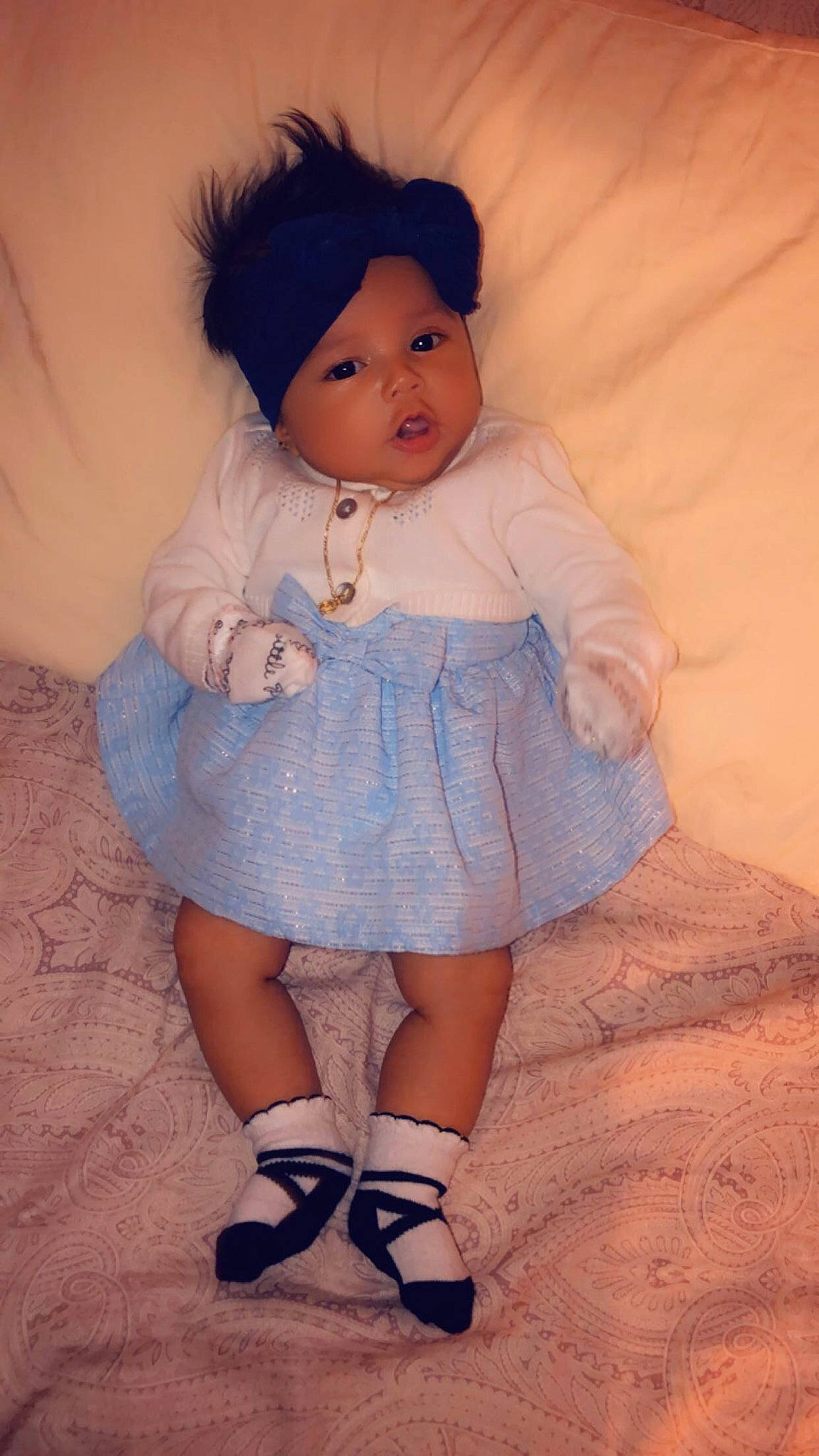 Jezabel joined the competition — help win amazing prizes! baby, baby_products, baby_toddler_clothing, black_hair, blue, cheek, child, eye, footwear, headwear, iris, leg, lip, person, pink, product, shoe, skin, smile, standing