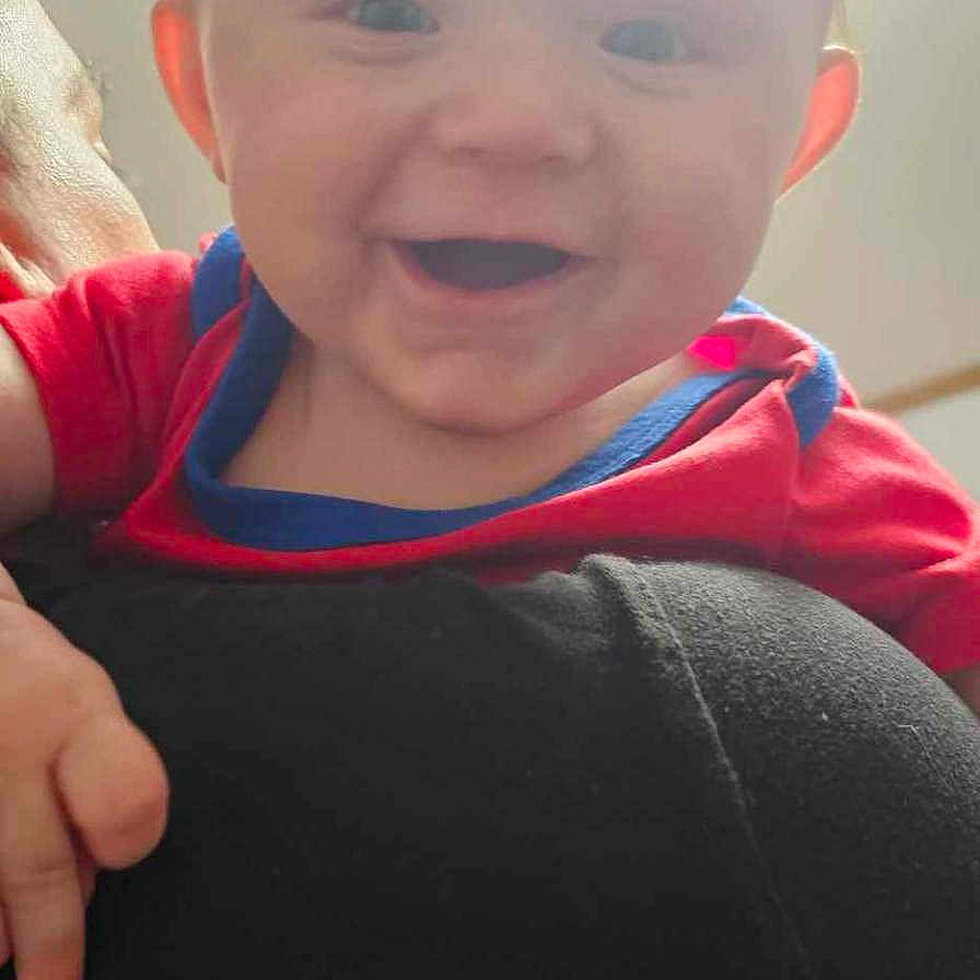 Willy joined the competition — help win amazing prizes! baby, bodypart, clothing, coat, face, finger, hand, happy, head, indoors, jacket, laughing, mouth, pants, person, photography, portrait, smile, t_shirt, teeth