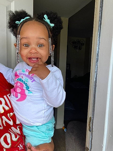 Kensleigh joined the competition — help win amazing prizes! black_hair, cheek, child, eye, face, fun, hair, hairstyle, happy, head, joy, lip, long_hair, person, pink, room, skin, smile, standing, t_shirt