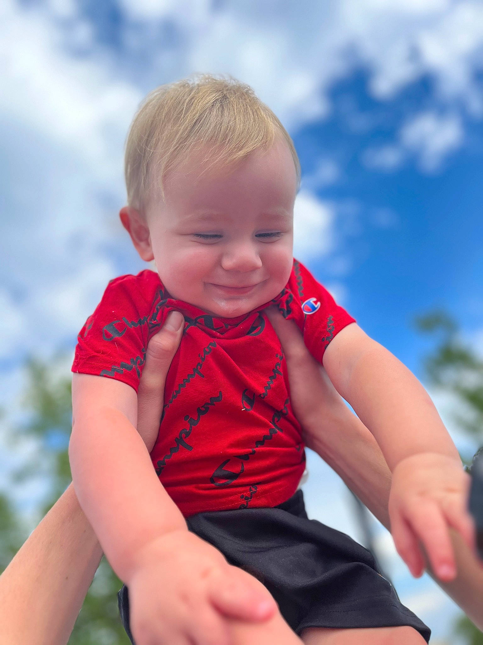Bentley is registered to the contest to win money with this photo: arm, baby_toddler_clothing, child, cloud, facial_expression, finger, flash_photography, fun, grass, hand, happy, human, human_body, joy, leisure, people_in_nature, person, skin, sky, smile