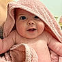 arms, baby, blanket, child, closeup, cute, expression, face, happy, head, indoors, infant, person, pink, portrait, skin, smile, soft, towel, wet