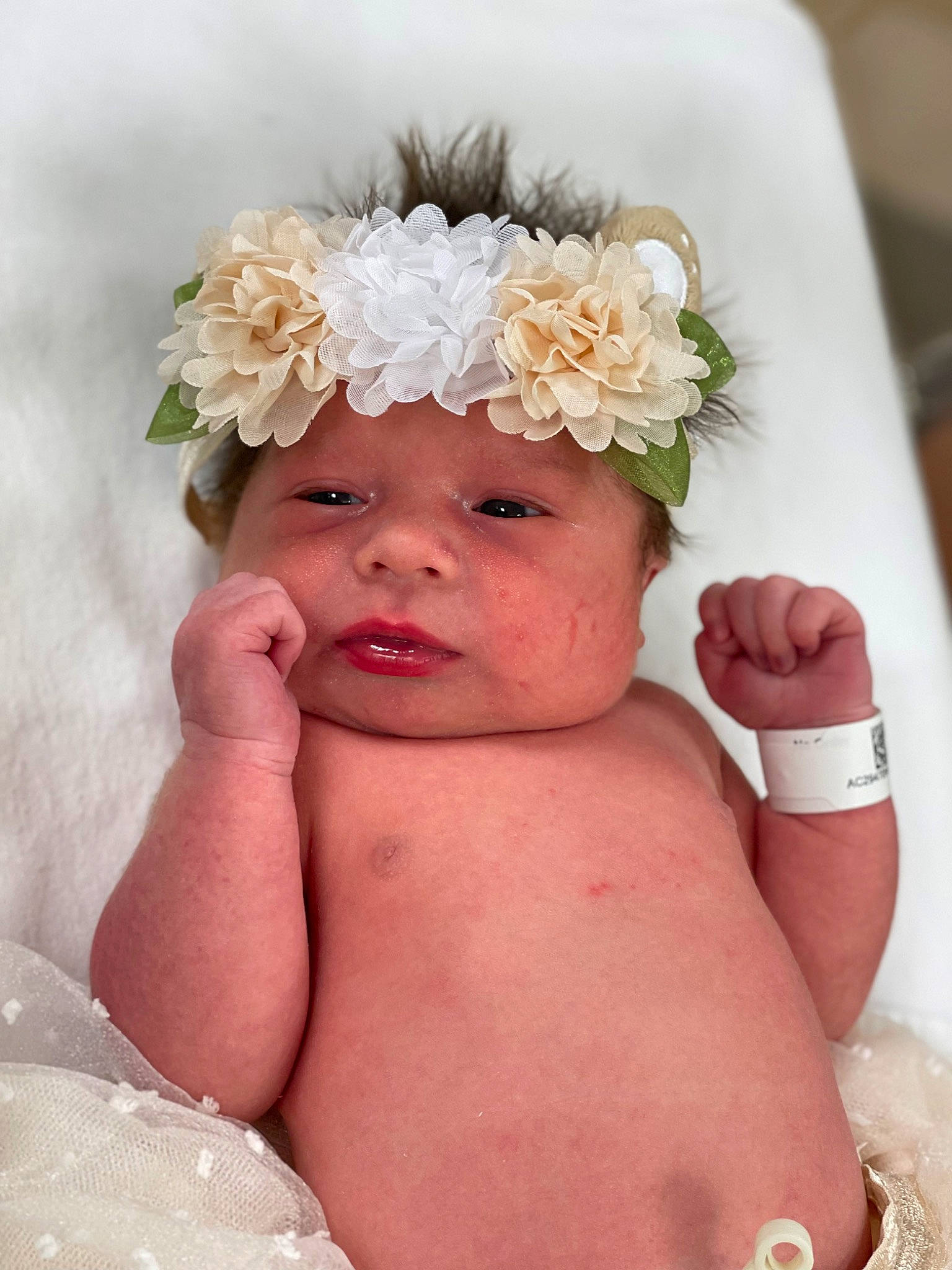 Dreamiee is registered to the contest to win money with this photo: artificial_flower, baby, baby_toddler_clothing, bridal_accessory, cap, child, face, finger, flower, hand, happy, headband, headgear, headpiece, headwear, jewellery, person, petal, pink, skin