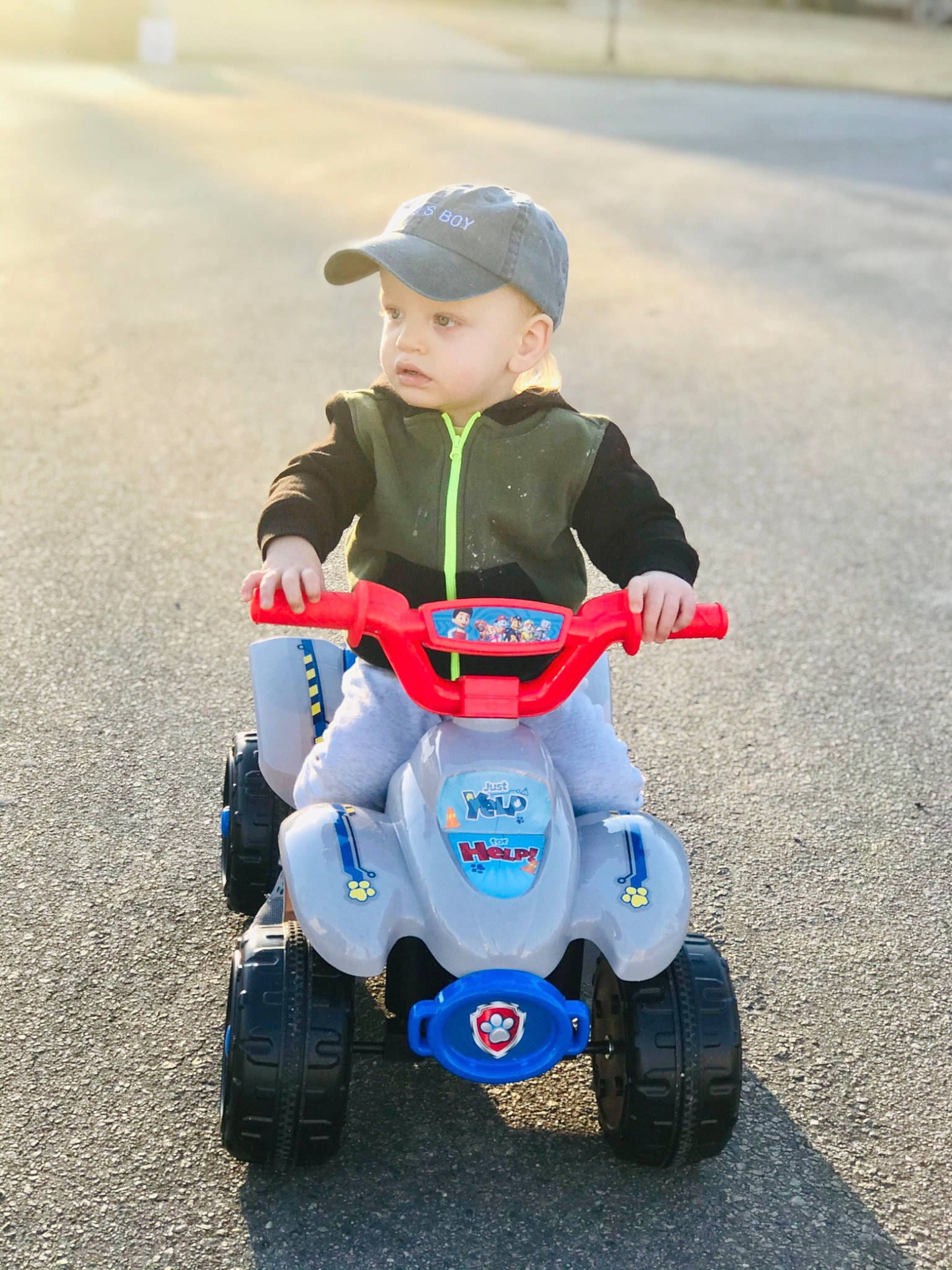 Bo joined the competition — help win amazing prizes! baby, baby_toddler_clothing, baseball_cap, cap, child, cobalt_blue, electric_blue, headwear, person, plastic, play, riding_toy, rolling, tire_care, toddler, toy, toy_vehicle, tread