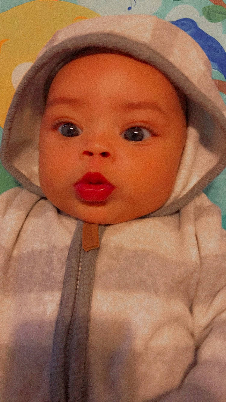 Kash is registered to the contest to win money with this photo: baby, cap, cheek, close_up, comfort, eyebrow, eyelash, headgear, headwear, iris, jacket, linens, lip, mouth, nose, organ, outerwear, person, pink, skin