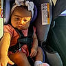 baby, baby_hand, bow, car, car_interior, car_seat, child, child_safety, cute, headband, infant, pink_outfit, portrait, seat, seatbelt, serious_face, socks, straps, sunlight, young_child