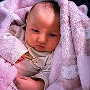 Oakleigh is registered to the contest to win money with this photo: baby, blanket, pink, soft, cozy, infant, wrapped, cute, face, skin, clothing, sleepwear, hand, warm, portrait, newborn, comfort, indoors, peaceful, expression